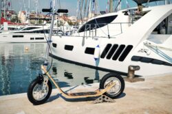 Dockside Mobility - No Batteries, No Fuss. boardy next to a boat