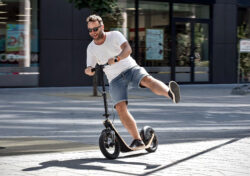 Kickscooter For Fun a man riding boardy