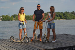 Boardy = Social Ride Vibes a group of people with boardies on a dock