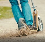 Ride Off The Beaten Path riding through dirt/gravel