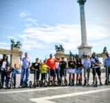 Join The Movement from our friends - group of boardy riders lined up in front of heroes’ square in budapest.